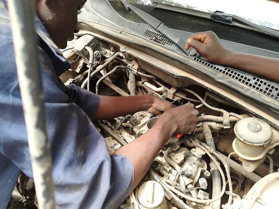 Mechanic repairing an engine
